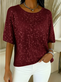 Livia – Elegante top met subtiele glans