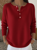Nora – Zachte trui met knoopdetail
